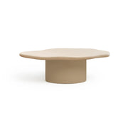 The Jamie Coffee Table in Micro Plaster with a sleek glass top and sculptural base – a modern white coffee table round in design, ideal for UAE interiors.